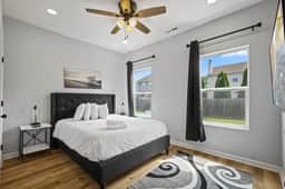 Modern 4BR | Chef's Kitchen + Soaking Tub · Indy